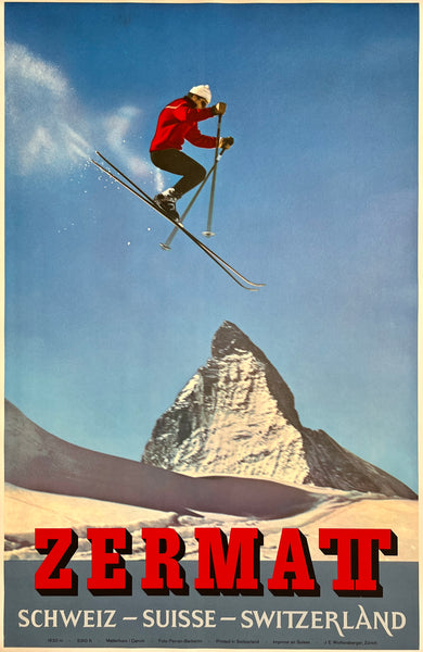 Original vintage Zermatt- Switzerland linen backed travel and tourism poster featuring a photo by Perren-Barberini of a ski jumper with Matterhorn in the background circa 1964.