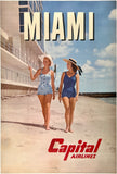 Original vintage Miami - Capital Airlines linen backed mid-century modern aviation airline travel and Florida tourism poster featuring women in bathing suits walking along the beach, circa 1950s.